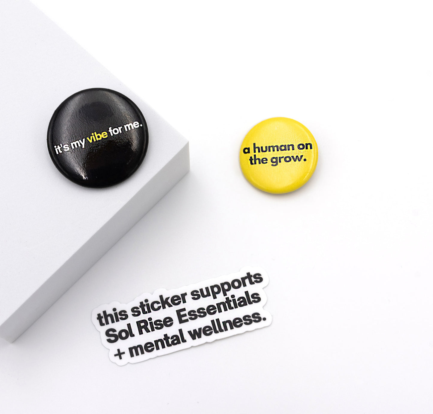 Sol Rise Essentials affirmation pins and stickers