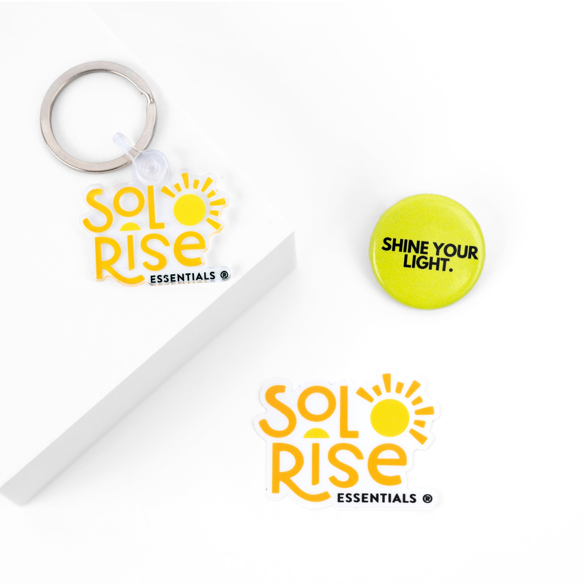 sol rise essentials orange logo keychain and other accessories